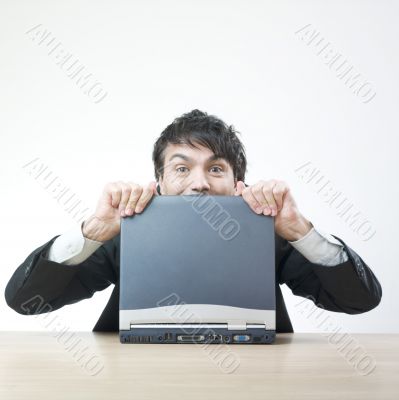 Happy man with computer