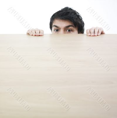 Man hiding himself.