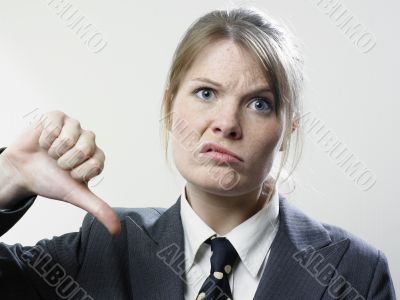 Businesswoman with Thumb Down