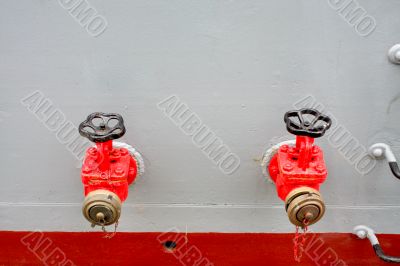 Firefighting taps at a military ship