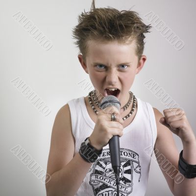 Boy yelling in microphone