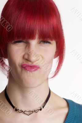 woman turns nose