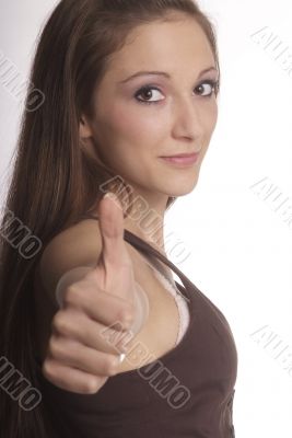 woman shows thumb