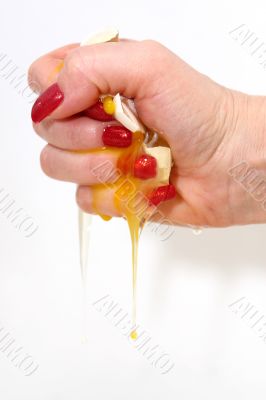 The female hand presses an egg on the night of February, 29th The female hand presses an egg on the night of February, 29th