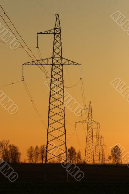 row of electricity pylons