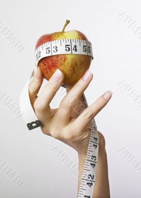 Apple and tape measure