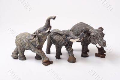 Three ceramic elephant figurines