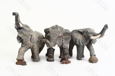 Three ceramic elephant figurines