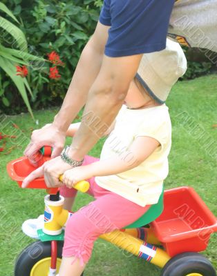 Toddler Learning to Ride Trike