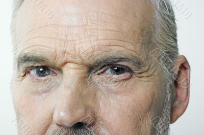 Old man`s eyes closeup