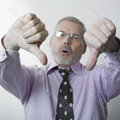 Man giving thumbs-down sign