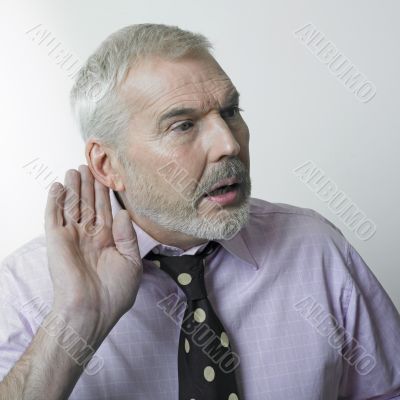 Man with hearing problem