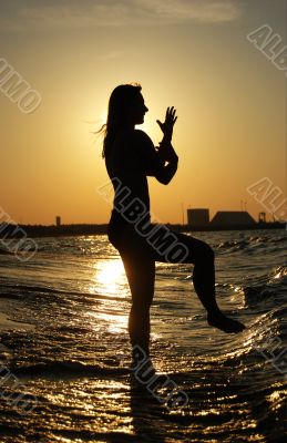 Sunset Tai Chi on a beach