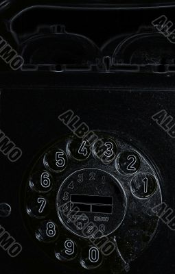 black retro telephone on white