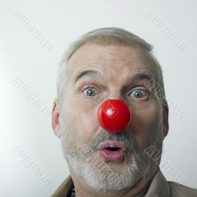 Man with red nose