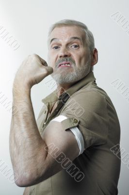Man showing arm muscles