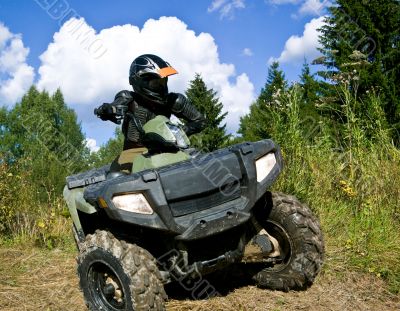 Sportsman riding quad bike Sportsman riding quad bike
