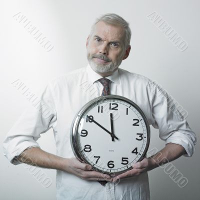 Businessman with clock