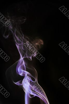 Colored blue-yellow cigarette smoke Colored blue-yellow cigarette smoke