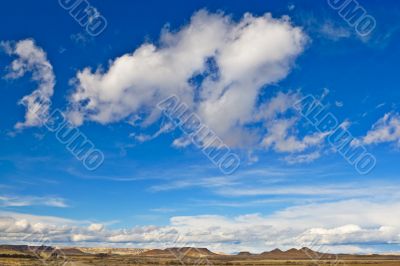 Hill under the cloudy sky