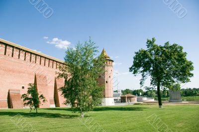 Bricks citadel and trees in Russia, summer day