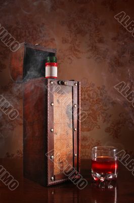 Still life with cognac glass and bottle Still life with cognac glass and bottle