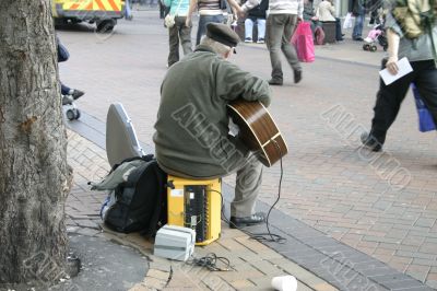 Busker with Electric Guitar