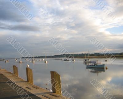 Boats on an English River at Sunset