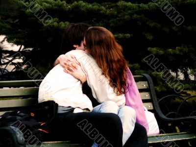 hugging couple hugging couple