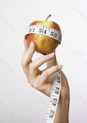 Apple and tape measure