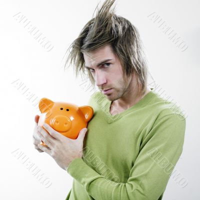Man holding piggy bank Man holding piggy bank