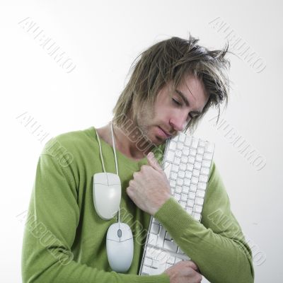 Man hugging keyboard