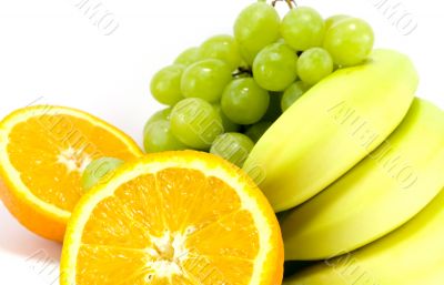 grapes, bananas and two halves of orange