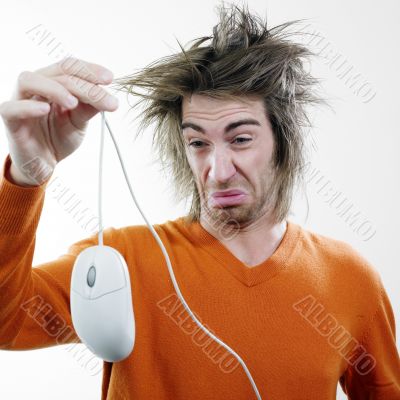 Man Holding a Computer Mouse