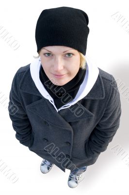 girl in cap, coat and gym shoes