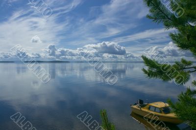 Boat on lake shore