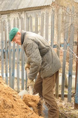 man digging ground