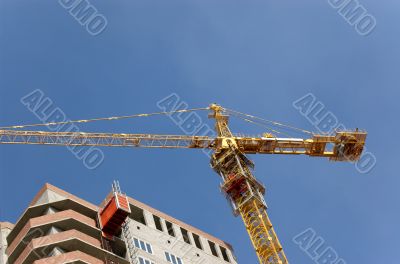 Lifting crane building the house