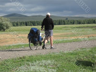 One cyclist go to road.