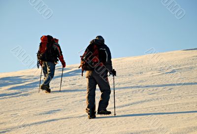 Two climbers hiking. Two climbers hiking.