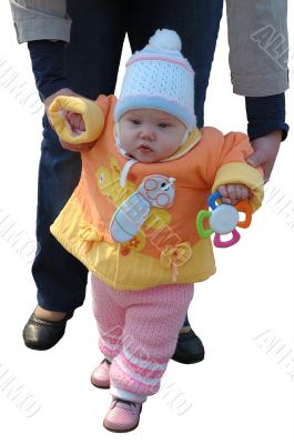 First steps of little girl. First steps of little girl.