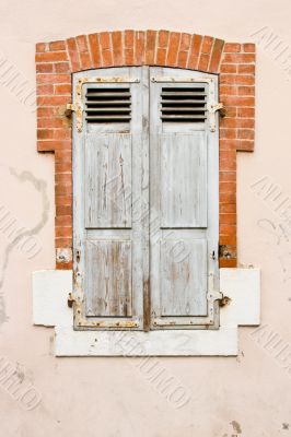 Old shuttered window