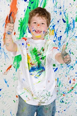 Boy playing with painting Boy playing with painting