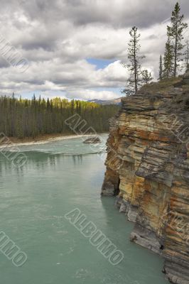 Wood, the river and clouds