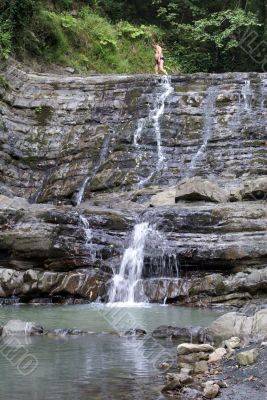 Man on the waterfall