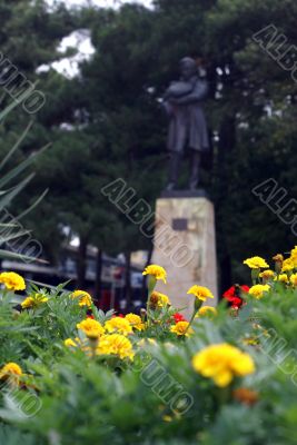 Flowers and statue