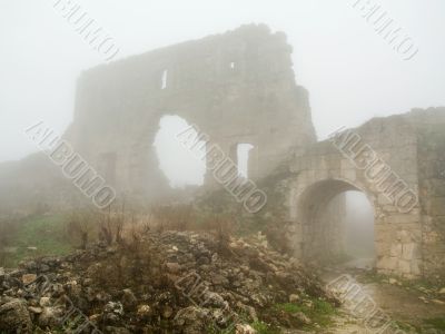 age-old stronghold gate arched mist morning age-old stronghold gate arched mist morning
