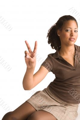 African girl gives a peace sign