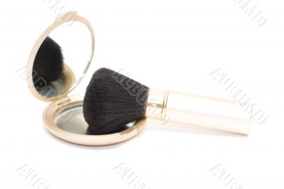 Brush for makeup reflected in mirror