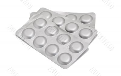 pills in a gray blister pack, isolated on white